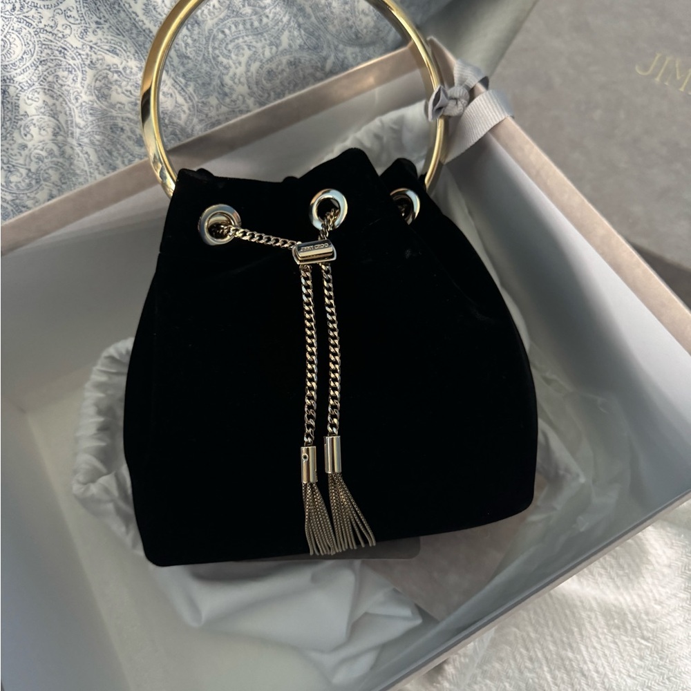 Elegant Black Velvet Bag with Gold Accents